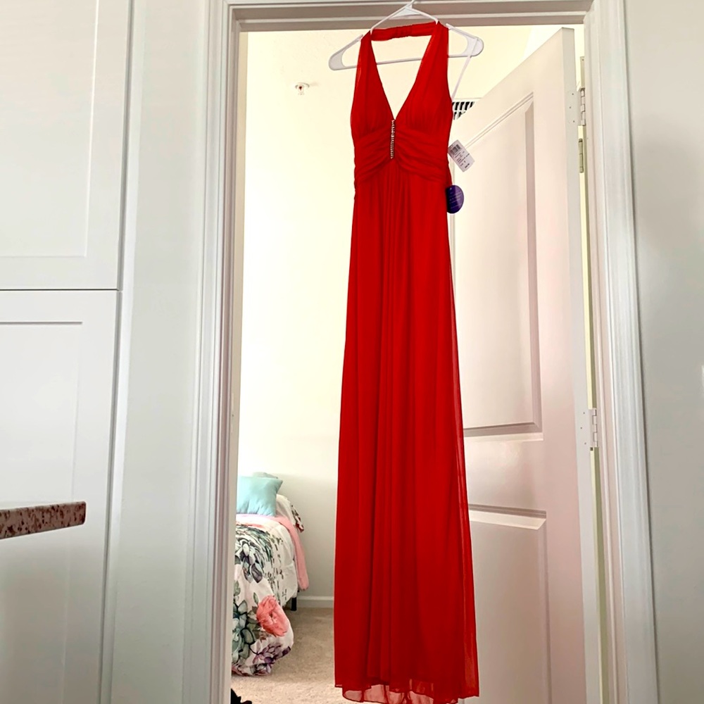 Salmon Colored gown new with tags on it